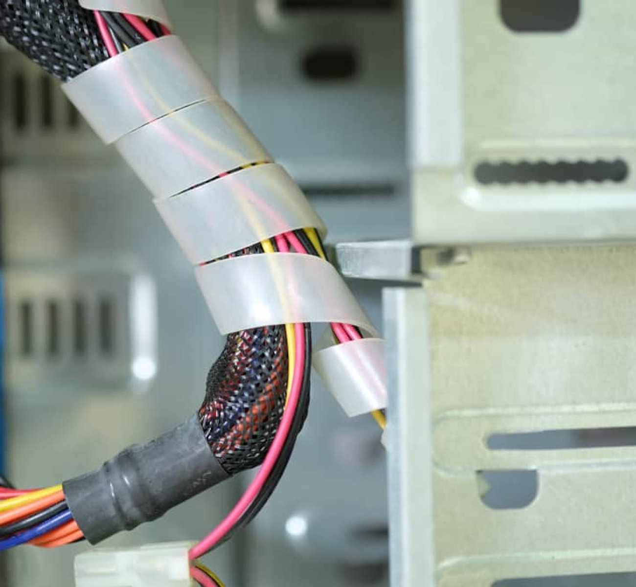 Technician testing network connections in server room