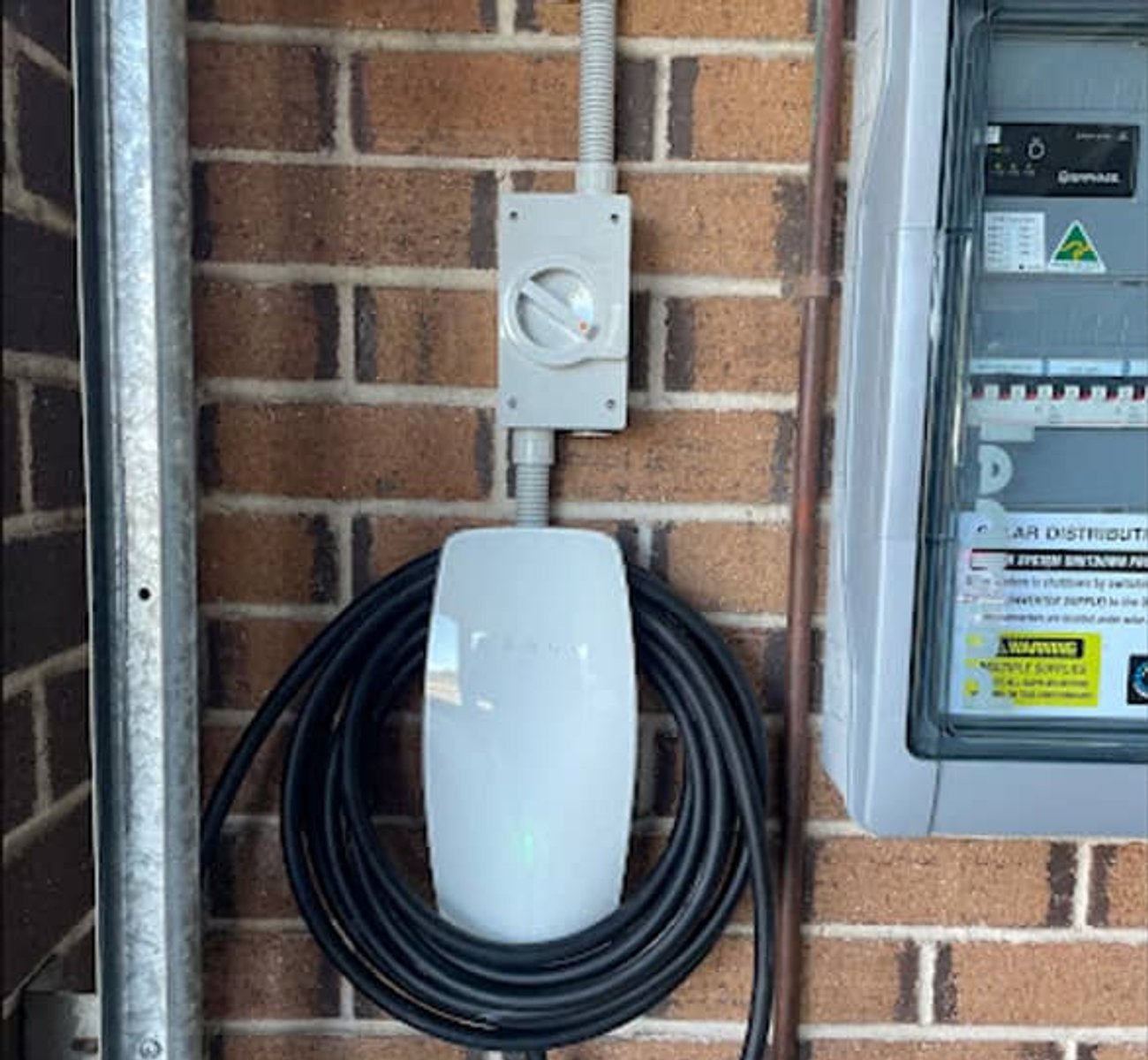 Satisfied customer with newly installed EV charger