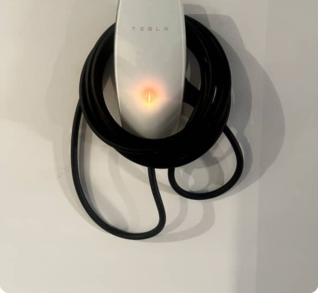 Professional electrician installing an EV charger