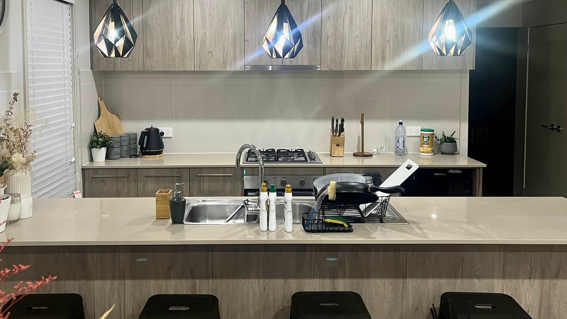 Professional electrician lighting a kitchen